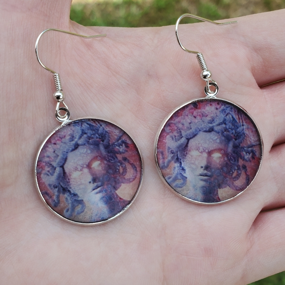 Medusa dangle earrings
